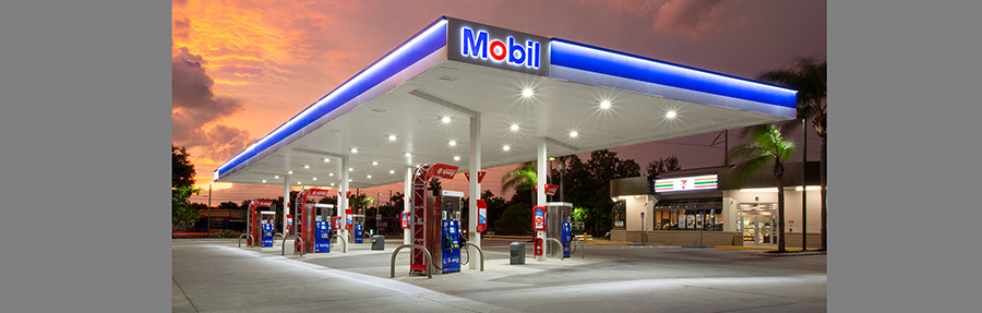 Mobil canopy at night at 7-Eleven